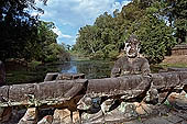 Preah Khan temple - west entrance of the fourth enclosure, the bridge lined by devas and asuras.